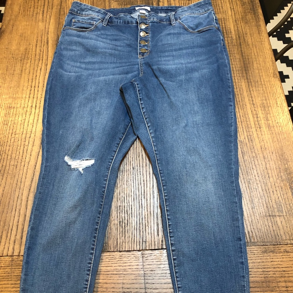 Button fly distressed jeans